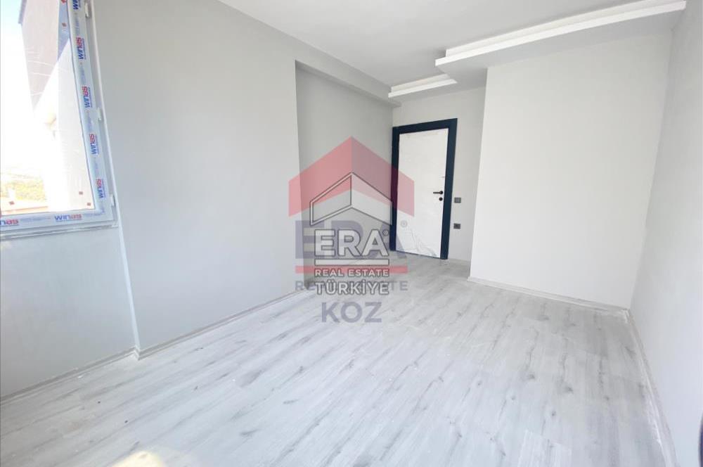 ERA KOZ'DAN KOYUNCU'DA MERKEZİ LOKASYON GENİŞ SATILIK 2+1 DAİRE