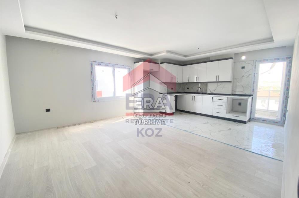 ERA KOZ'DAN KOYUNCU'DA MERKEZİ LOKASYON GENİŞ SATILIK 2+1 DAİRE