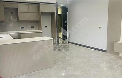 MANAVGAT ILICA'DA HAVUZLU AMERİKAN MUTFAKLI SATILIK 1+1 DAİRE