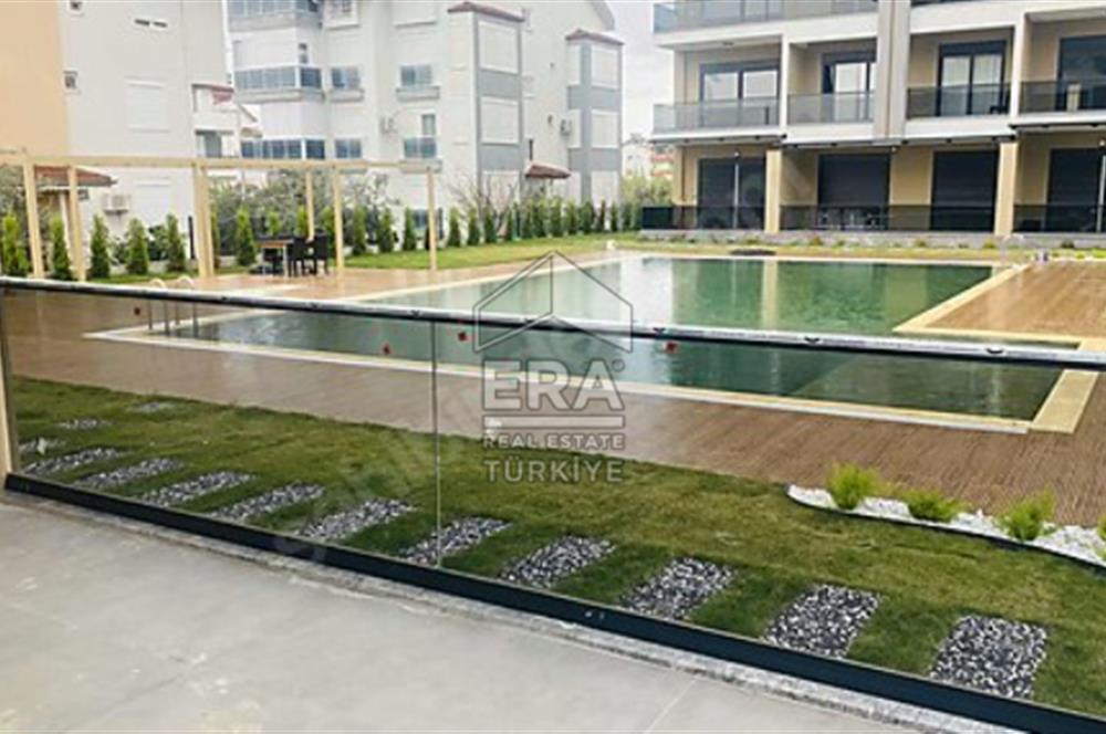 MANAVGAT ILICA'DA HAVUZLU AMERİKAN MUTFAKLI SATILIK 1+1 DAİRE
