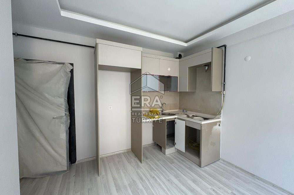 https://www.sahibinden.com/ilan/emlak-konut-satilik-buca-dicle-mahallesi-satilik-sifir-2-plus1-daire-1249337117/detay