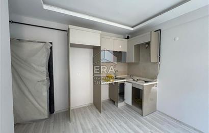 https://www.sahibinden.com/ilan/emlak-konut-satilik-buca-dicle-mahallesi-satilik-sifir-2-plus1-daire-1249337117/detay