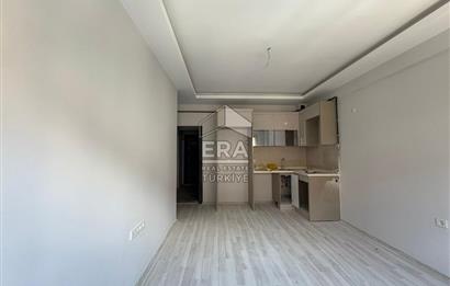 https://www.sahibinden.com/ilan/emlak-konut-satilik-buca-dicle-mahallesi-satilik-sifir-2-plus1-daire-1249337117/detay