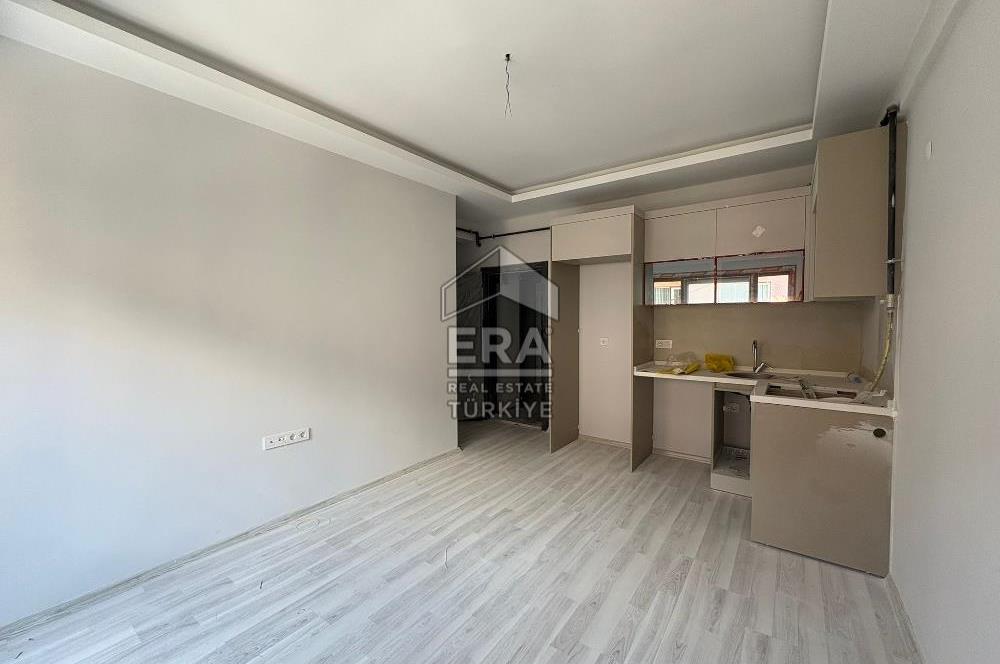https://www.sahibinden.com/ilan/emlak-konut-satilik-buca-dicle-mahallesi-satilik-sifir-2-plus1-daire-1249337117/detay