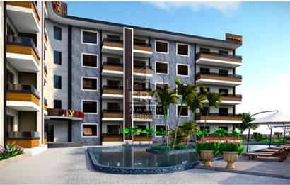 Altınovada havuzlu sitede satılık 1+1 daire