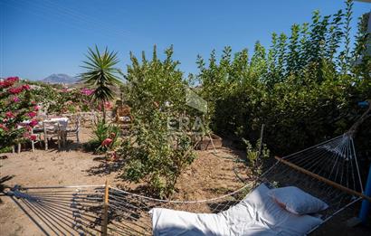 Datça Kızlan'da Satılık 550 m2 Arsada ve Müştemilatlı 3+2 Villa