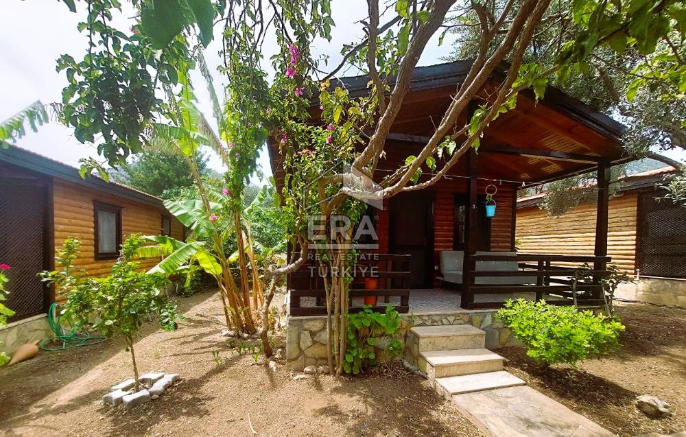 DATÇA OVABÜKÜ’NDE SATILIK 751 m2 ARSA PAYLI 4 ADET BUNGALOV EV