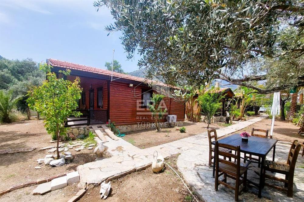 DATÇA OVABÜKÜ’NDE SATILIK 751 m2 ARSA PAYLI 4 ADET BUNGALOV EV