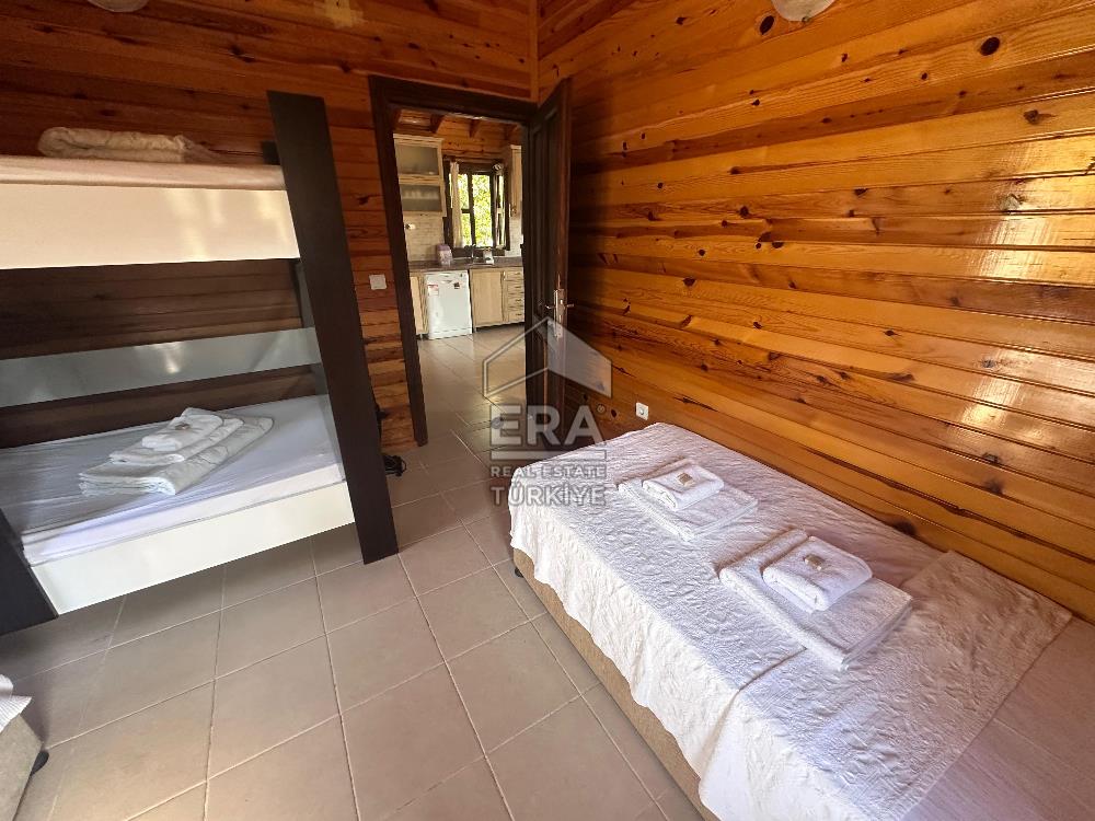 DATÇA OVABÜKÜ’NDE SATILIK 751 m2 ARSA PAYLI 4 ADET BUNGALOV EV