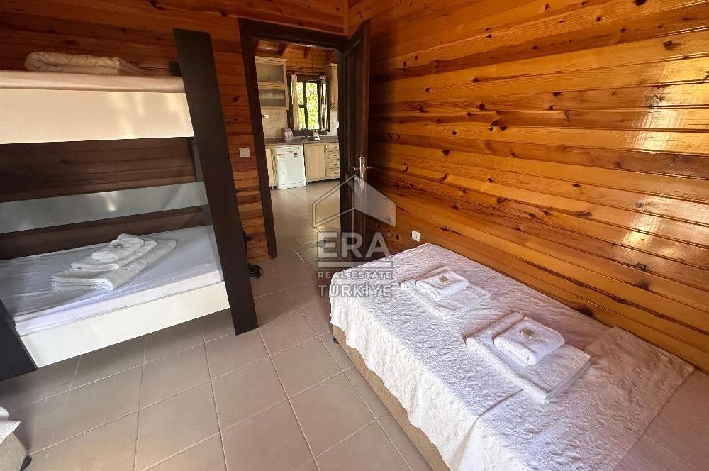 DATÇA OVABÜKÜ’NDE SATILIK 751 m2 ARSA PAYLI 4 ADET BUNGALOV EV