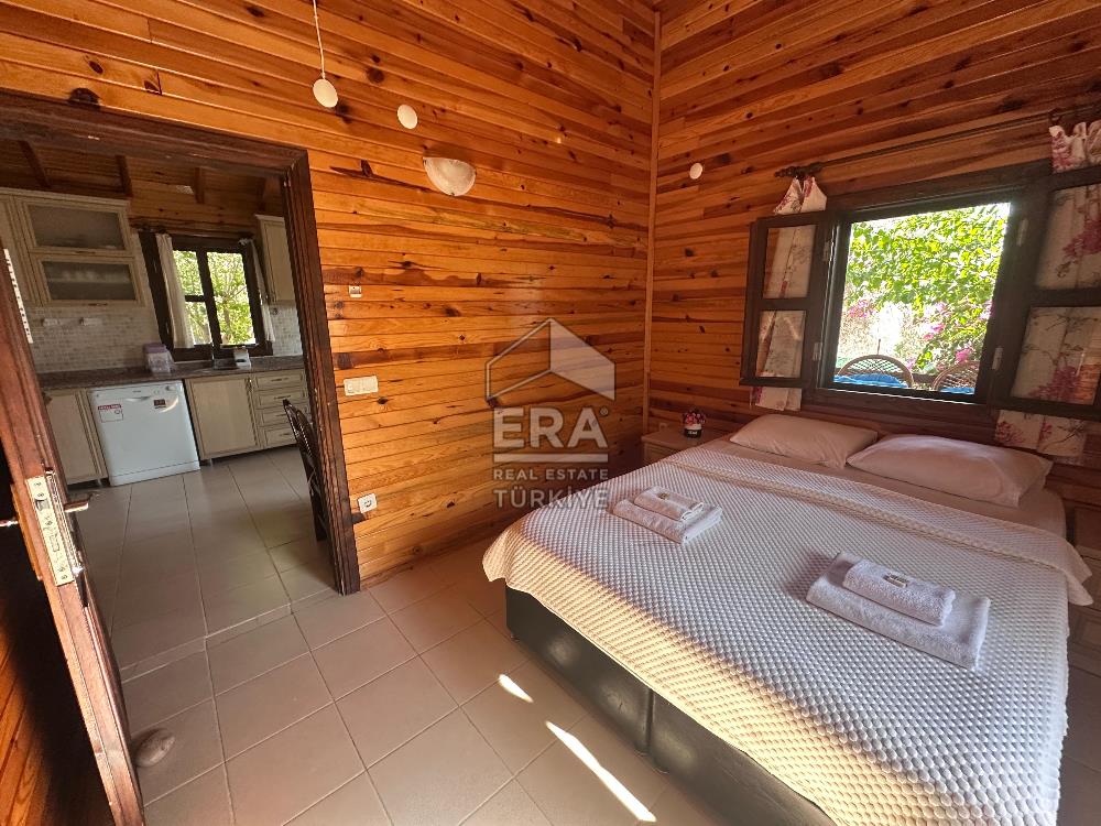 DATÇA OVABÜKÜ’NDE SATILIK 751 m2 ARSA PAYLI 4 ADET BUNGALOV EV