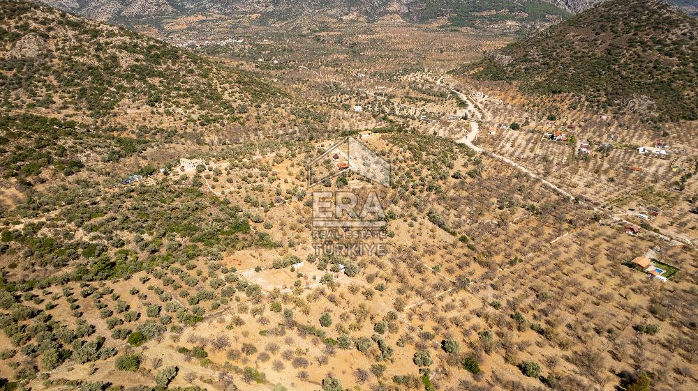  Datça Palamutbükü’nde 16.414 m2 Deniz Manzaralı İmarlı Arsa