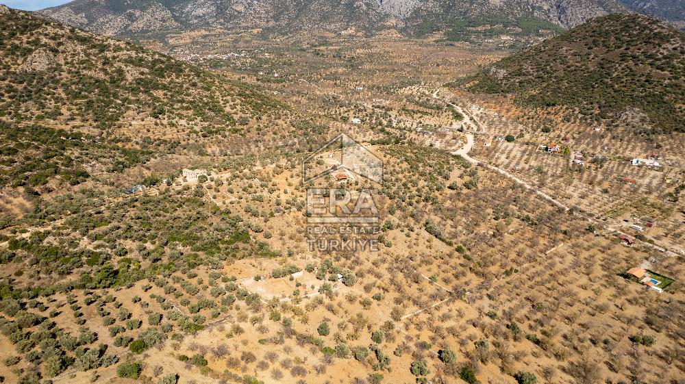  Datça Palamutbükü’nde 16.414 m2 Deniz Manzaralı İmarlı Arsa