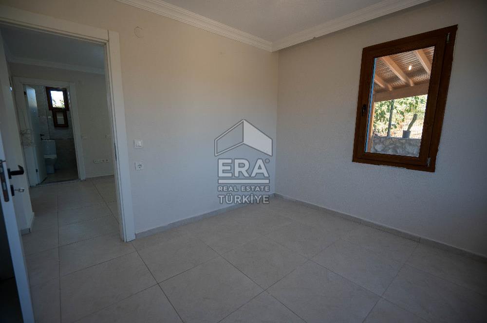 Datça Kızlan'da Satılık 550 m2 Arsada ve Müştemilatlı 3+2 Villa