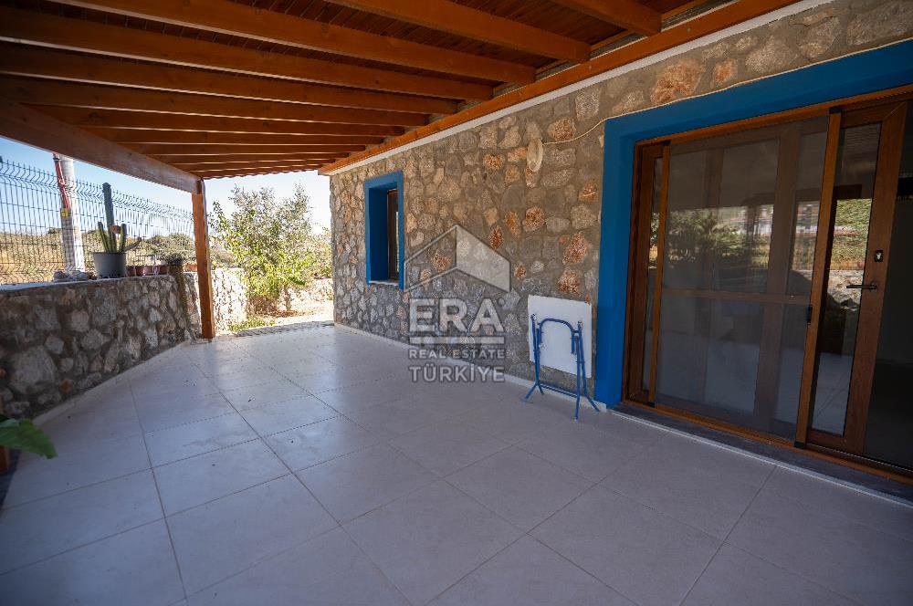 Datça Kızlan'da Satılık 550 m2 Arsada ve Müştemilatlı 3+2 Villa