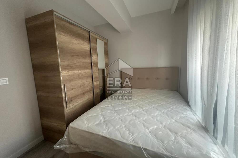 Seyrek Merkezde Full Eşyalı 1+1 Ara Kat Kiralık Daire