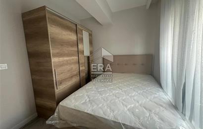 Seyrek Merkezde Full Eşyalı 1+1 Ara Kat Kiralık Daire