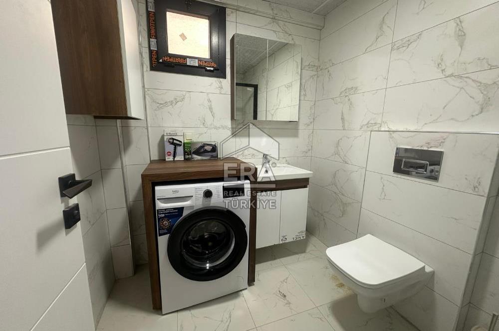 Seyrek Merkezde Full Eşyalı 1+1 Ara Kat Kiralık Daire