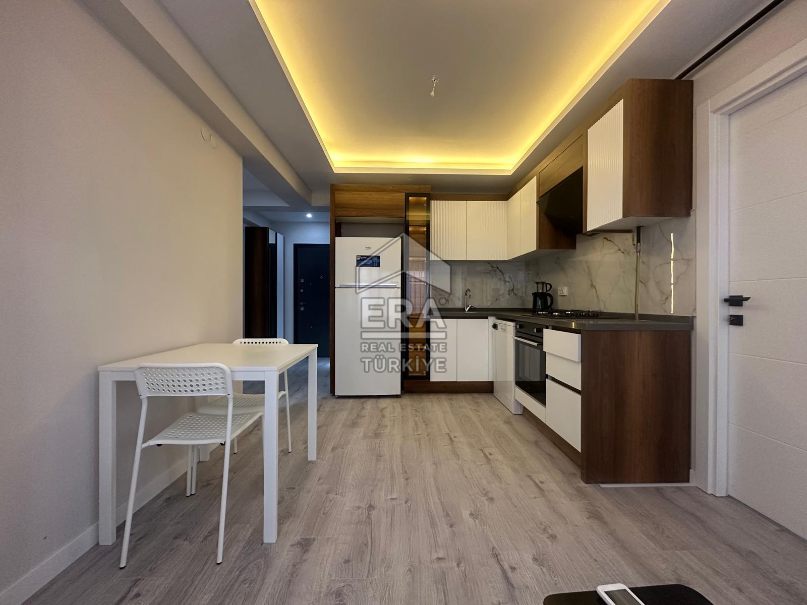 Seyrek Merkezde Full Eşyalı 1+1 Ara Kat Kiralık Daire