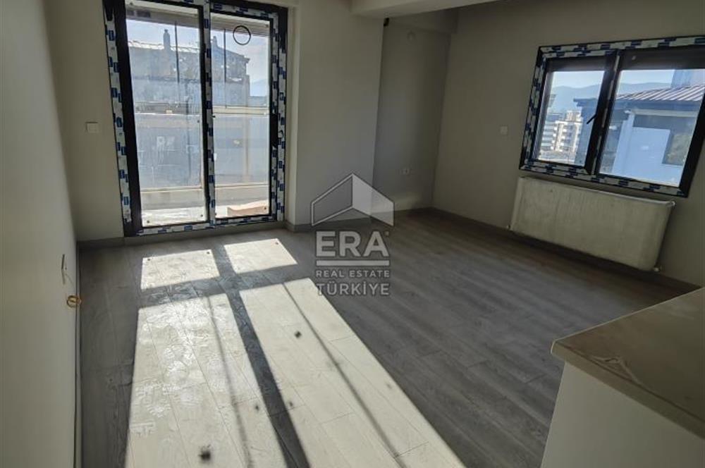 TORBALI MERKEZDE SIFIR BİNADA KİRALIK 1+1 DAİRELER