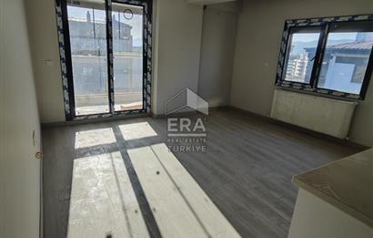 TORBALI MERKEZDE SIFIR BİNADA KİRALIK 1+1 DAİRELER