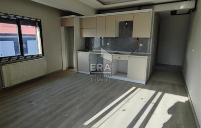 TORBALI MERKEZDE SIFIR BİNADA KİRALIK 1+1 DAİRELER