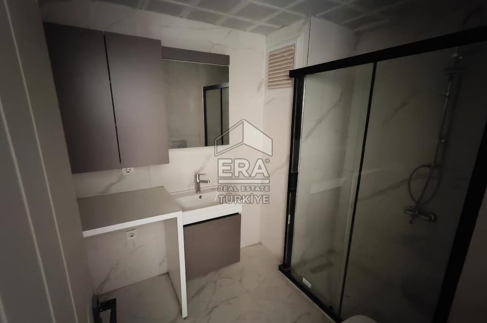 TORBALI MERKEZDE SIFIR BİNADA KİRALIK 1+1 DAİRELER