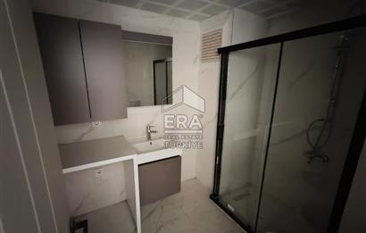 TORBALI MERKEZDE SIFIR BİNADA KİRALIK 1+1 DAİRELER