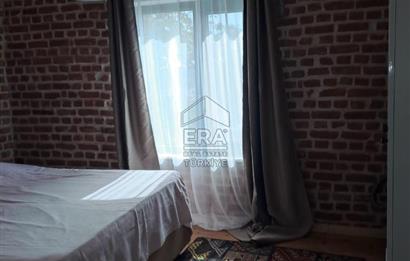 Ayvalık Fethiye Mahallesi’nde Kiralık 3+1 Bahçeli Masrafsız Rum Taş Ev