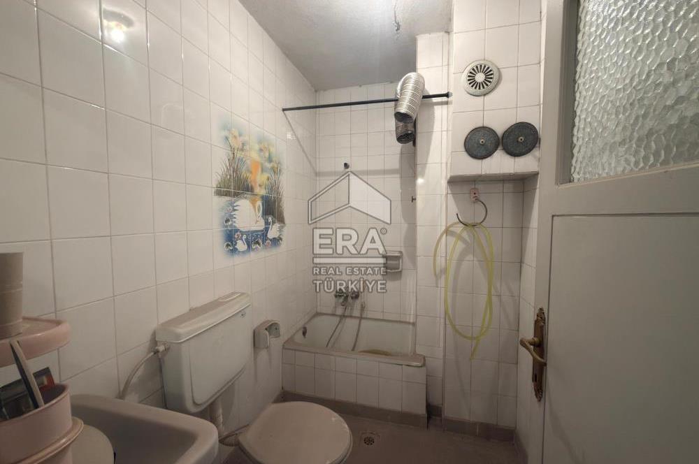 ERA PORT GÜVENCESİYLE CENGİZ TOPEL CADDESİ ÜZERİ BİNA