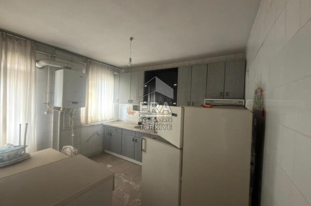 ERA PORT GÜVENCESİYLE CENGİZ TOPEL CADDESİ ÜZERİ BİNA